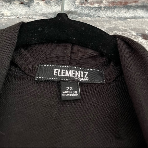 Beautiful black sweater with attached white tank underneath.Silver embellishment - Picture 3 of 5